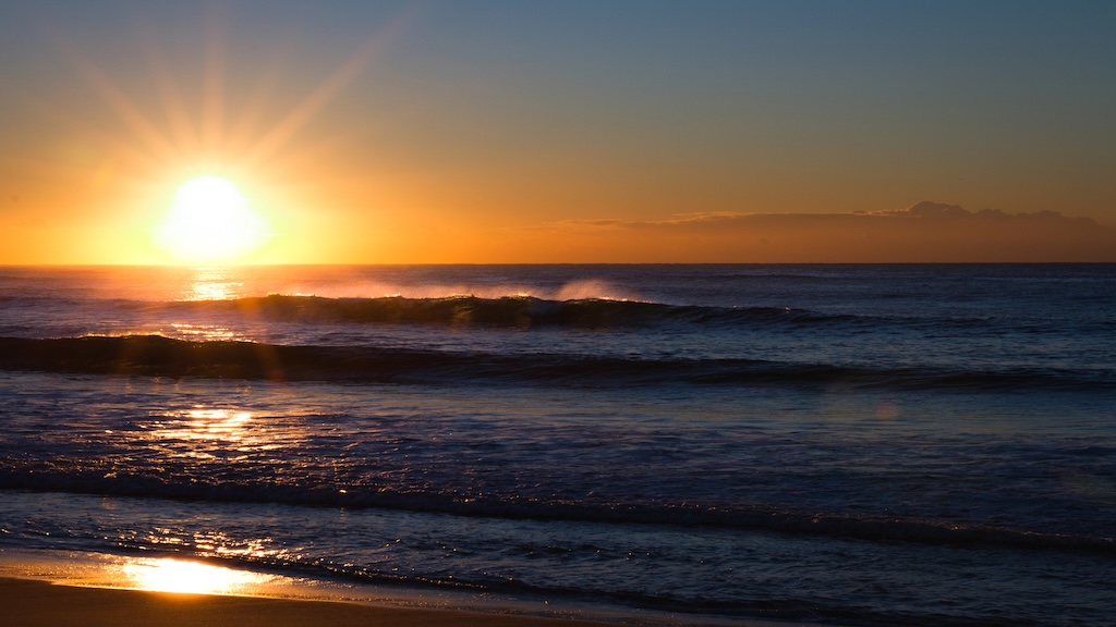 Sunrise over coastline