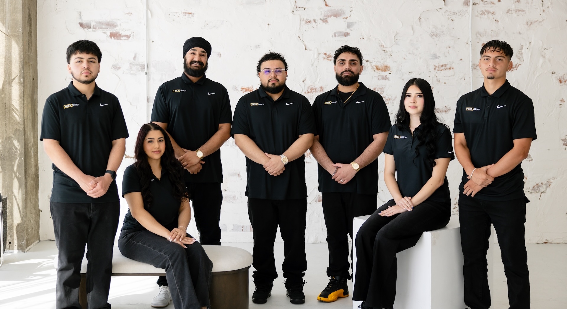 The Mesa Group Consulting team in a professional studio portrait — the people behind the promise