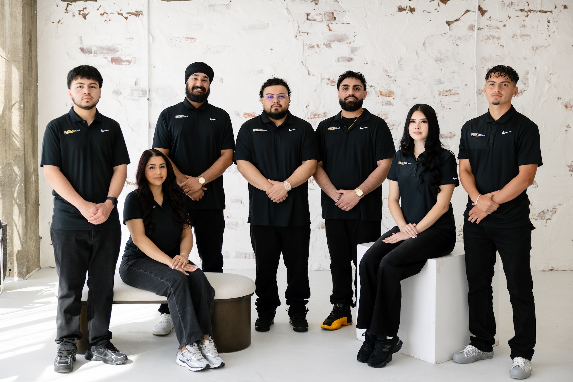 Mesa Group Consulting full team in professional black uniforms at the studio