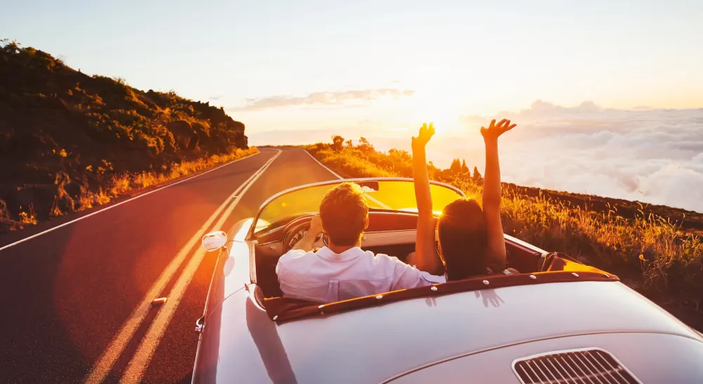 Couple enjoying a road trip on the Pacific Coast Highway