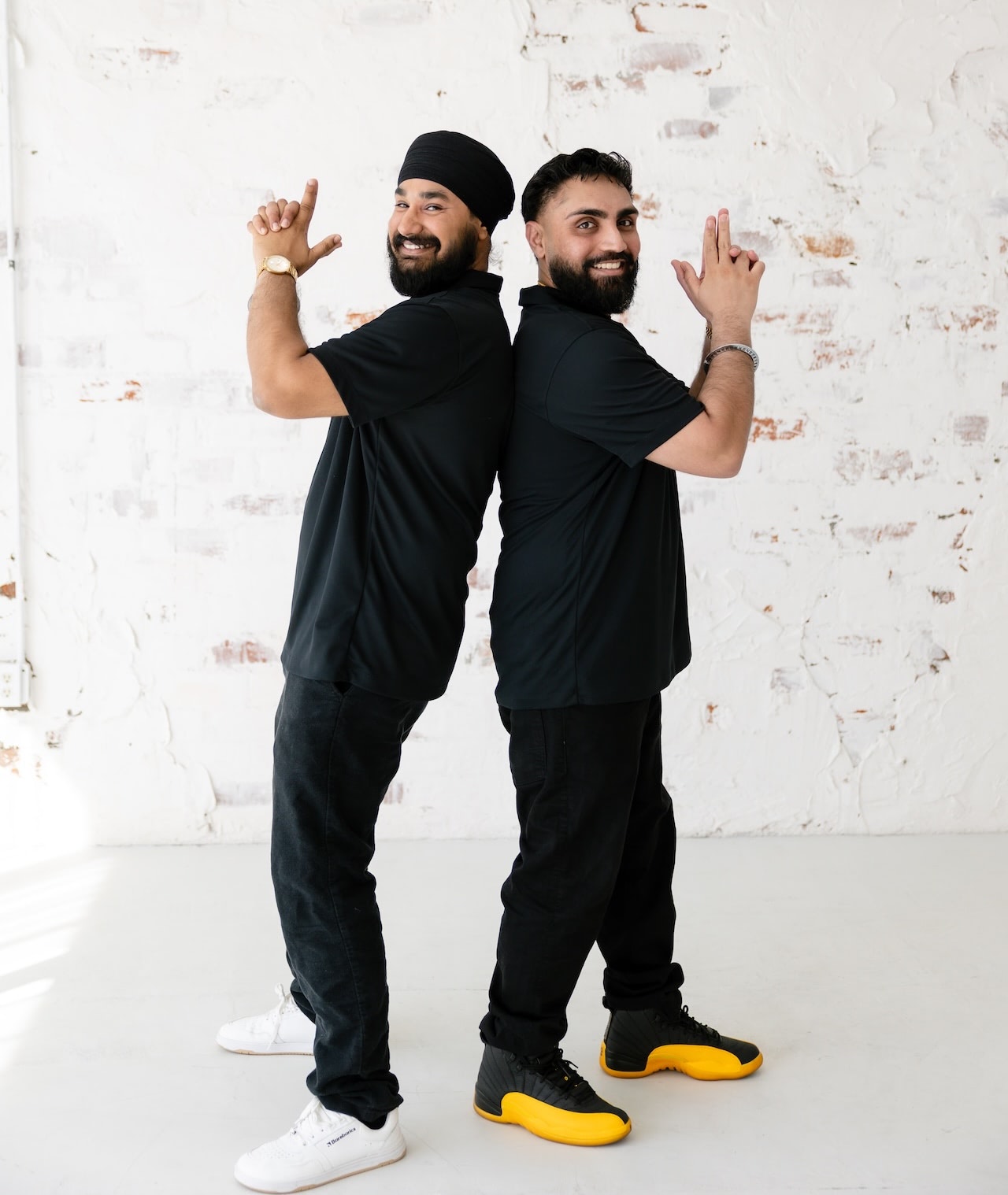 Harpreet Moore and Gurtej Singh of Mesa Group Consulting with playful confidence