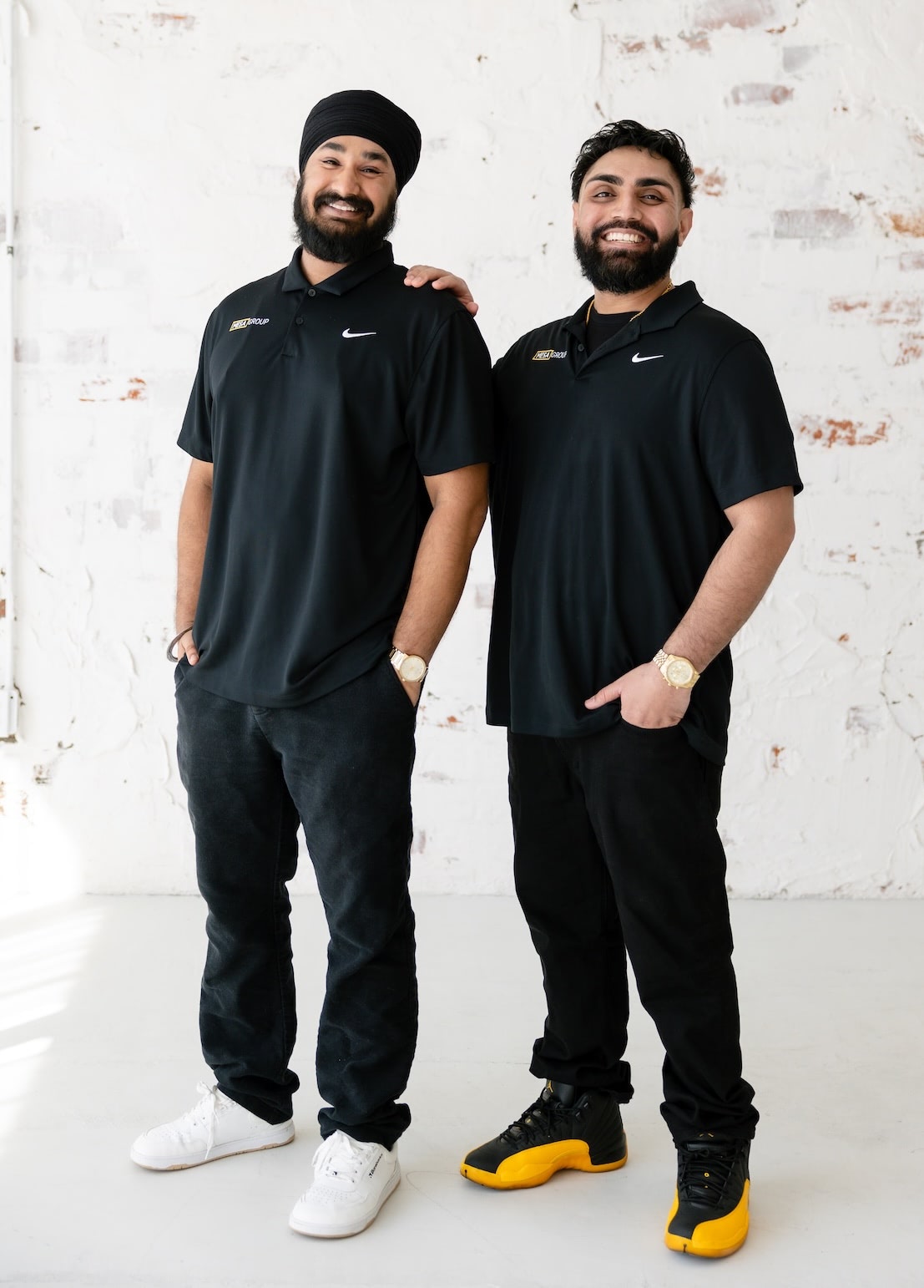 Harpreet Moore and Gurtej Singh of Mesa Group Consulting in a professional team portrait